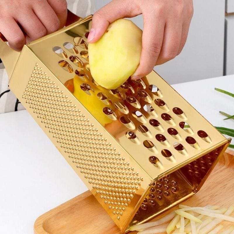 Ralador de Queijo e Legumes Multifuncional Dourado InoxRalador de Queijo e Legumes Multifuncional Dourado Inox
